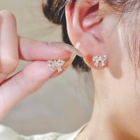 ribbon motif pierce