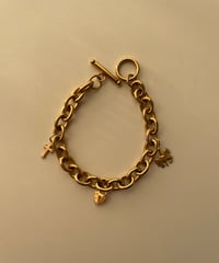 motif charm / stainless steel bracelet