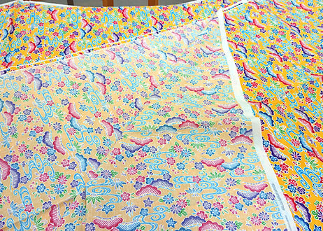 黄色の紅型（びんがた）布。小さい柄の沖縄柄綿生地。Made in JAPAN