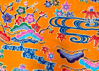 生地・反物＿オレンジ色の紅型（びんがた）布。大きい柄の沖縄柄綿生地。Made in JAPAN（手作り浴衣）