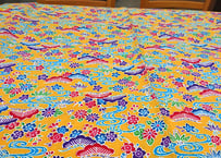 黄色の紅型（びんがた）布。小さい柄の沖縄柄綿生地。Made in JAPAN