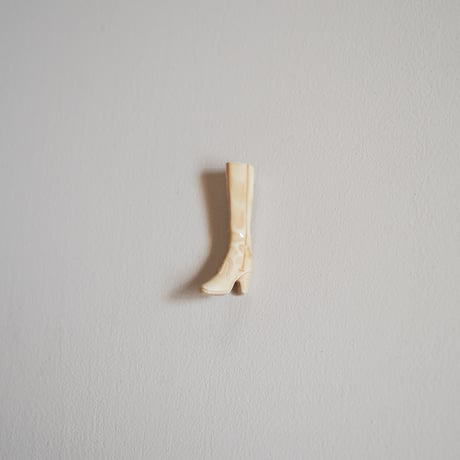 Boots brooch