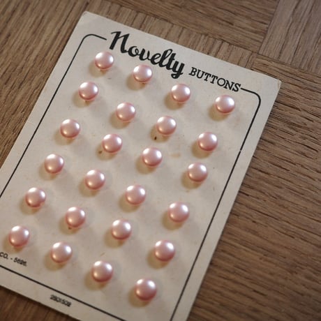 Pink pearl button sheet