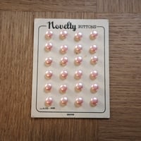 Pink pearl button sheet