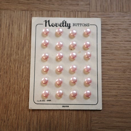 Pink pearl button sheet