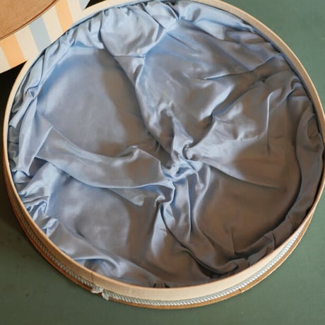 A box with a drawing of a carriage