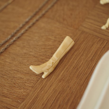 Boots brooch