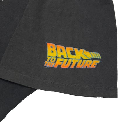BACK TO THE FUTURE Roads? Where we're going we don't need roads. UNIVERSAL TAG LARGE 0933