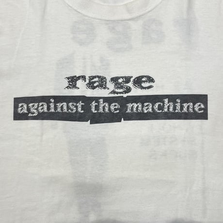 RAGE AGAINST THE MACHINE WE HAVE DETERMINED WHITE TOUCH OF GOLD LARGE 5625