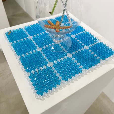 Beads block check mat