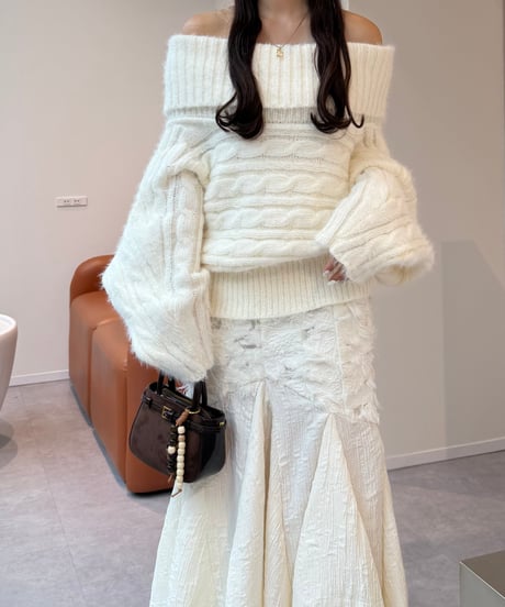 feather off shoulder cable knit