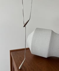 asymmetry cross necklace