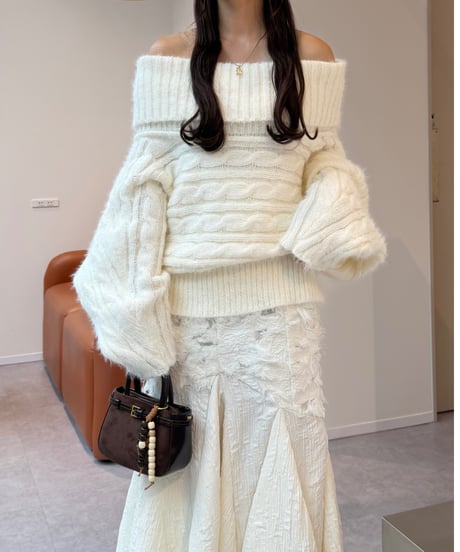 feather off shoulder cable knit