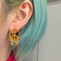 Peace ribbon pierce
