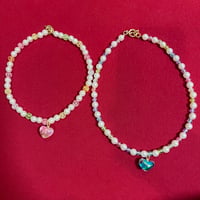 Pearl and pale color necklace
