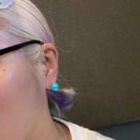 Colored pearl studded earrings