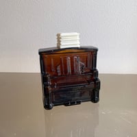 Avon bottle piano