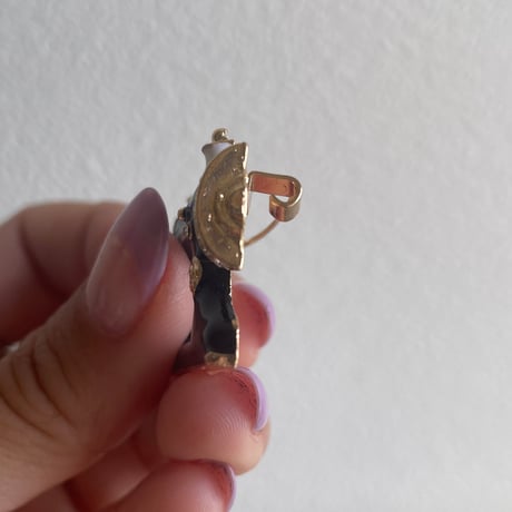 Sewing machine brooch