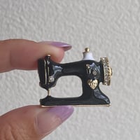 Sewing machine brooch