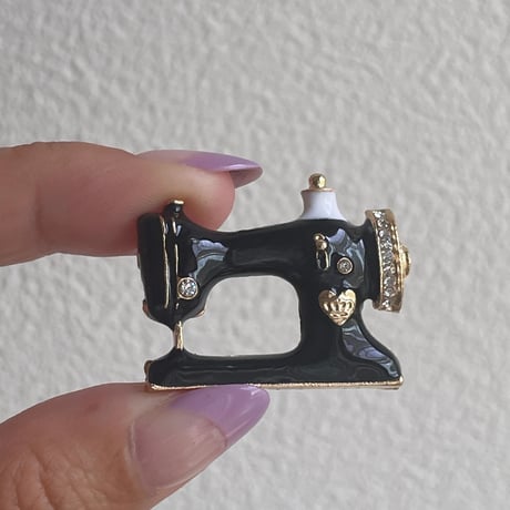 Sewing machine brooch