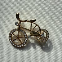 Bike brooch