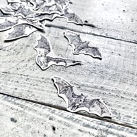 koumori  {flake seal}