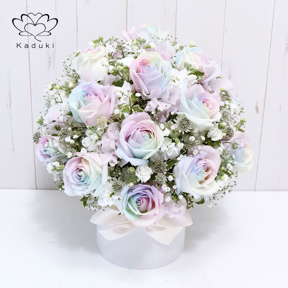 パステルカラーのフラワーアレンジメント レインボーローズ ピュアパステル 季節の花 アレンジメント(R