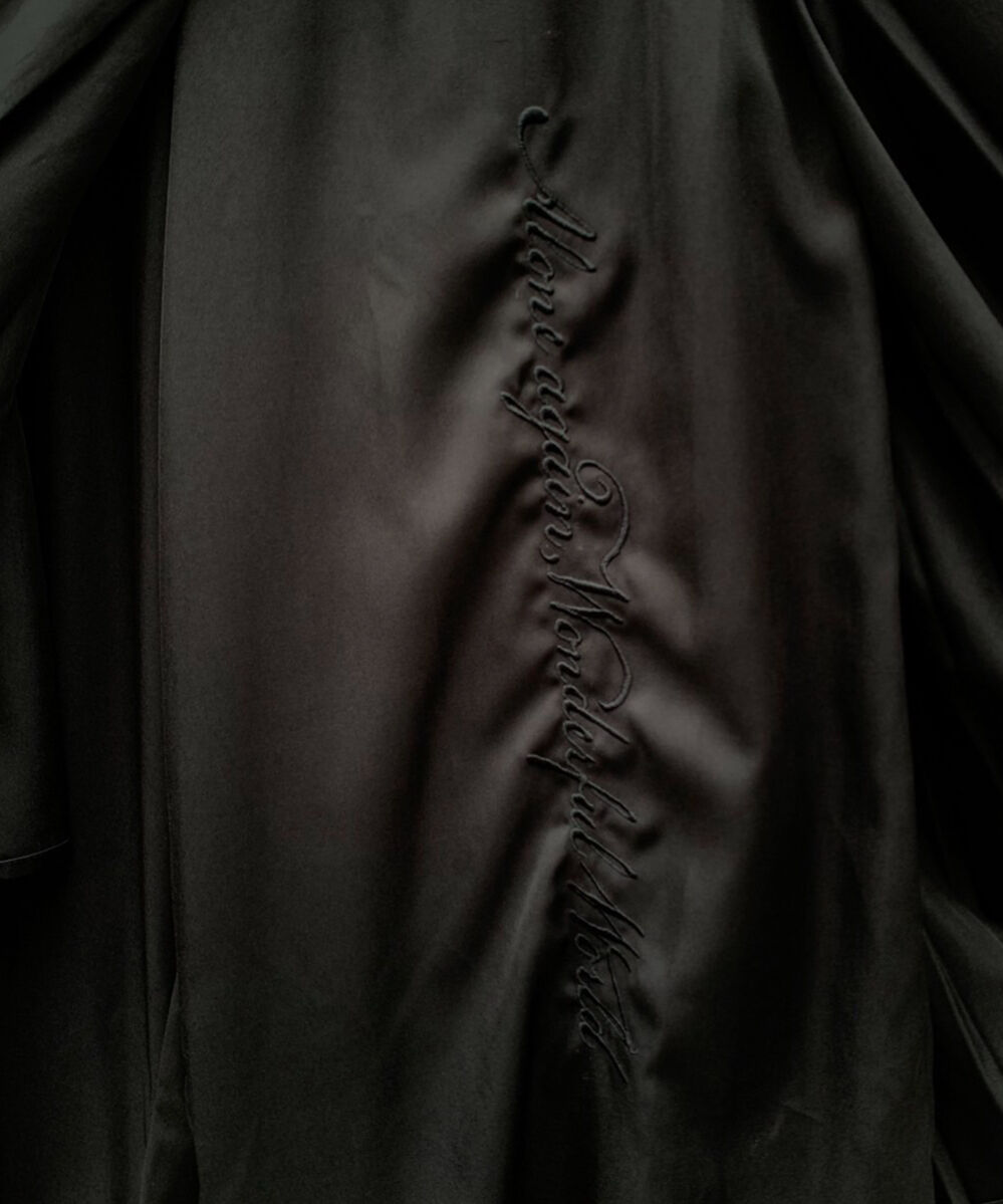 alone again, wonderful world” pleated wrap wid