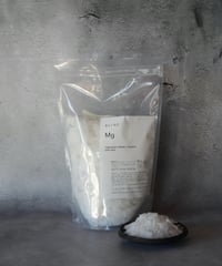 Mg