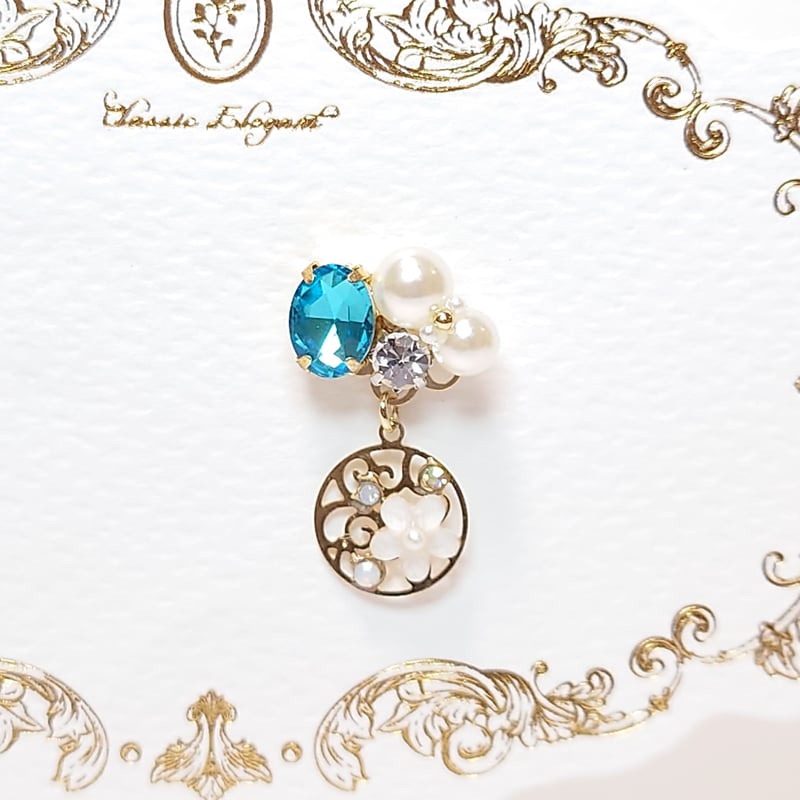 ビジューピアス サークル 花 ／ 水色 ／ ゴールド | Alice Fairy