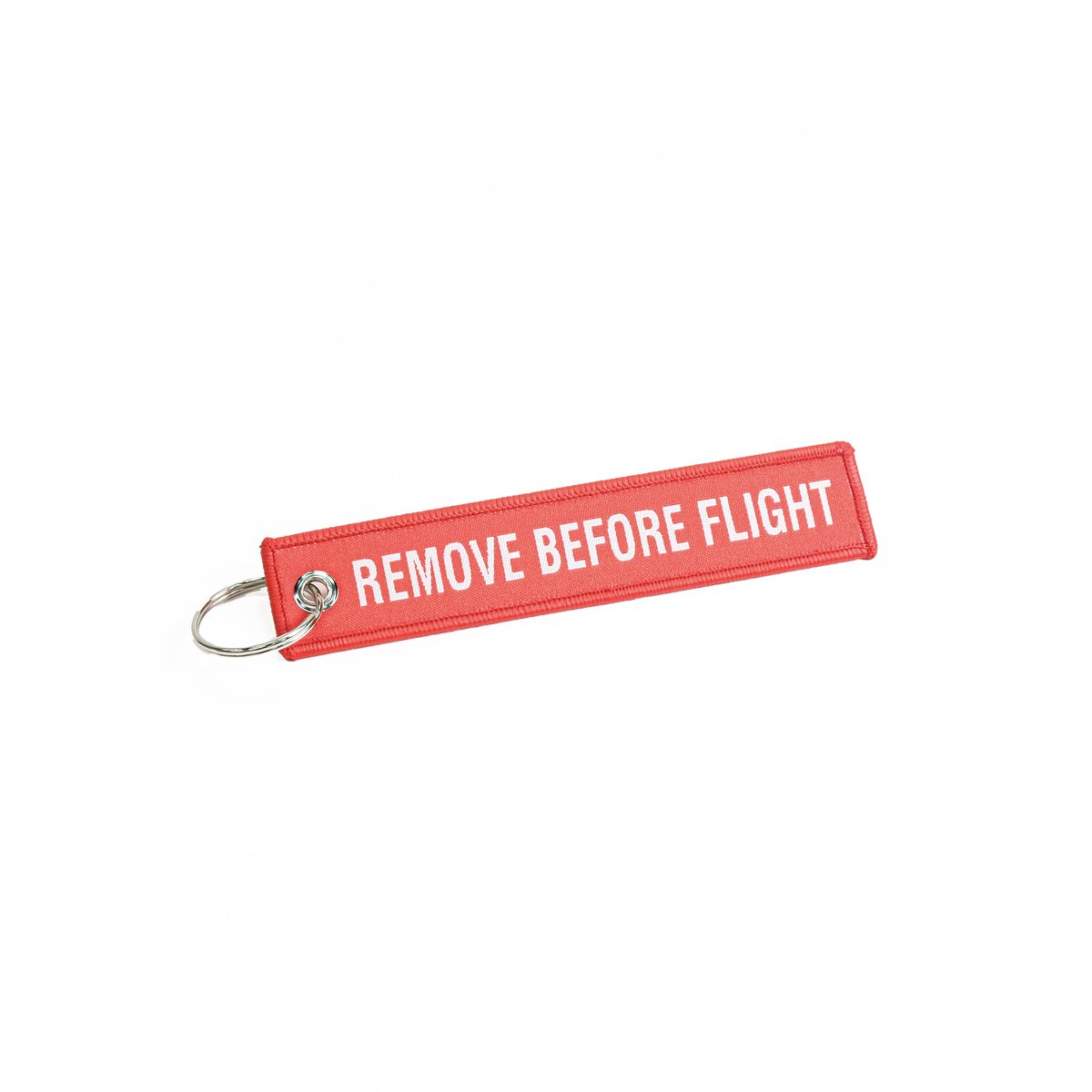 REMOVE BEFORE FLIGHT フラッグタグキーホルダー オンライン限定商品