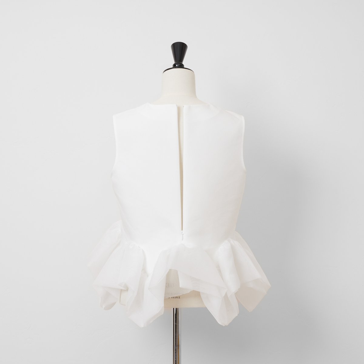 Prima Peplum Sleeveless white | HEVE
