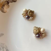 『猫の耳飾り』（パープル）コットンパール クリスタルのピアス/イヤリング cat-cottonperl-purple01