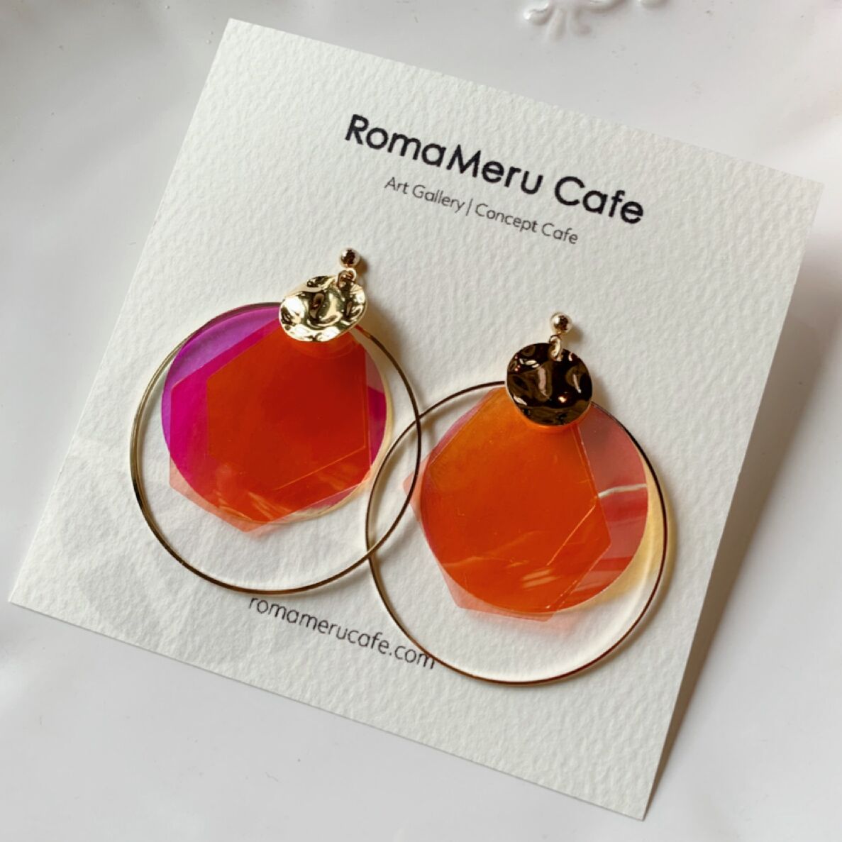 オーロラと光の輪』（オレンジ×レッド）キラキラビニールと