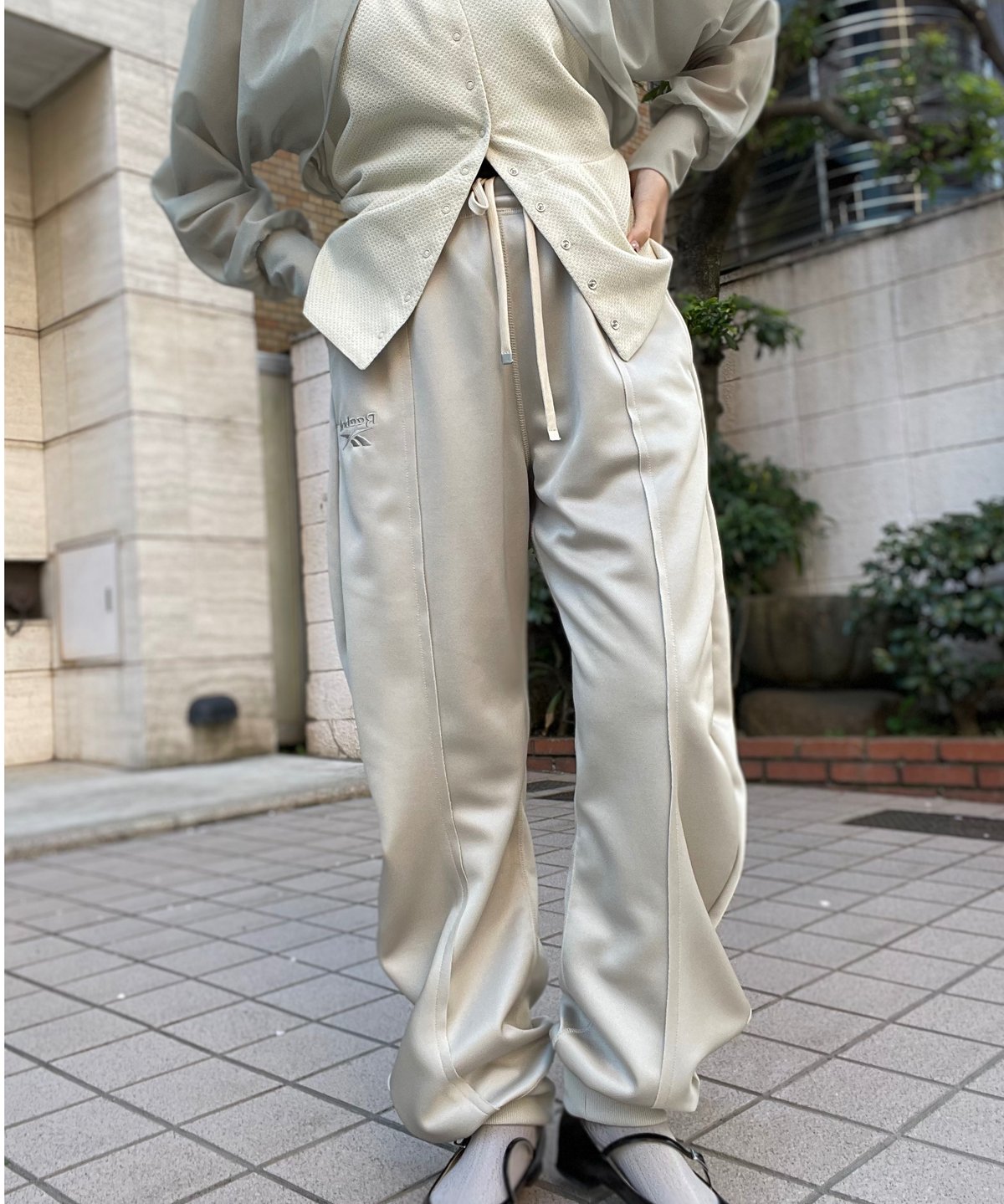 naokitomizuka / Reebok deformed sweatpants | JU