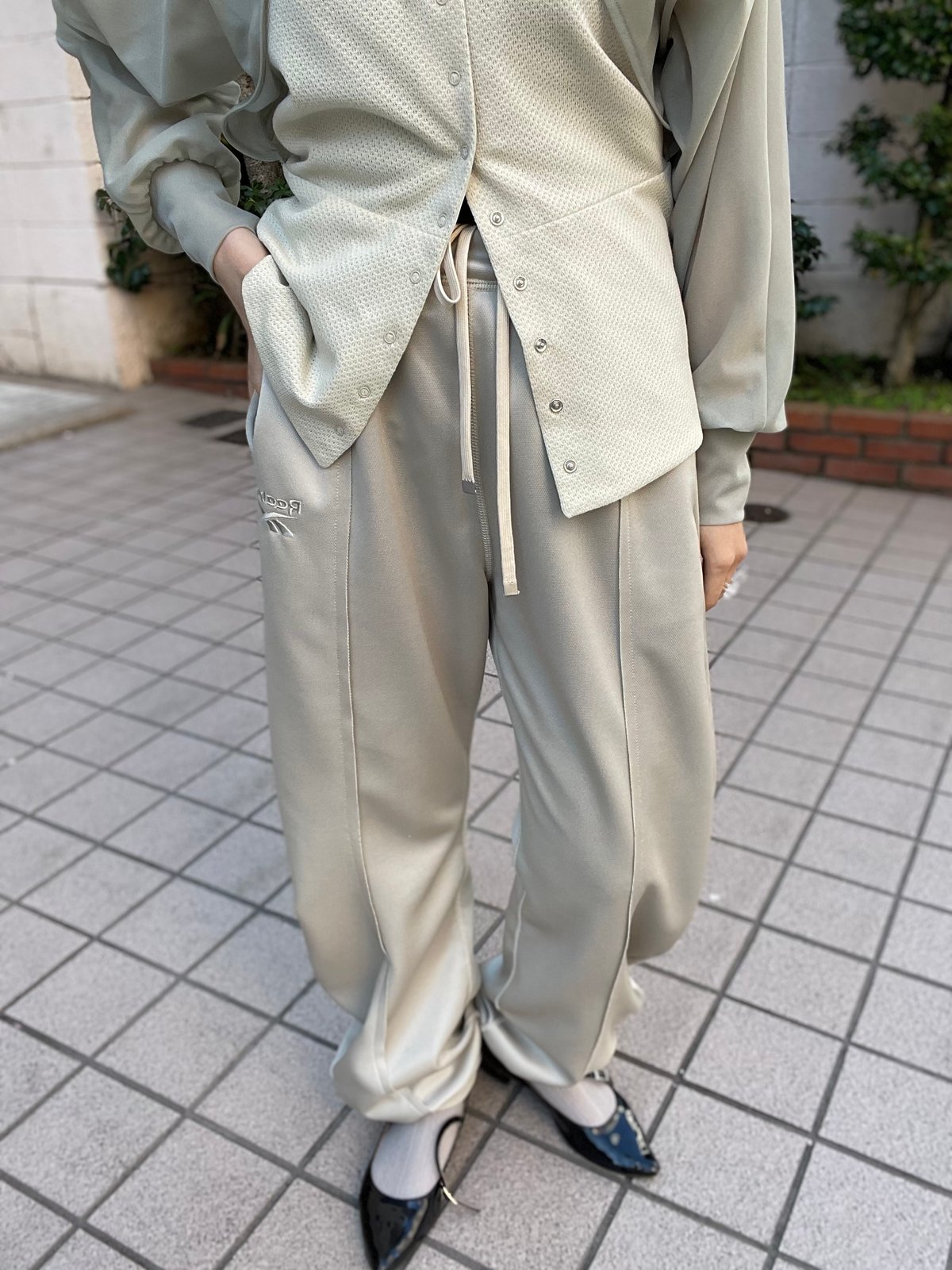 naokitomizuka / Reebok deformed sweatpants | JU