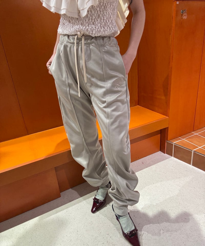 naokitomizuka / Reebok deformed sweatpants | JU