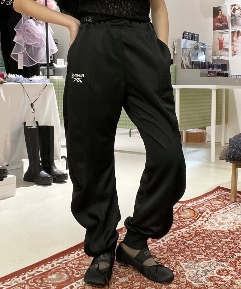 naokitomizuka / Reebok deformed sweatpants | JU