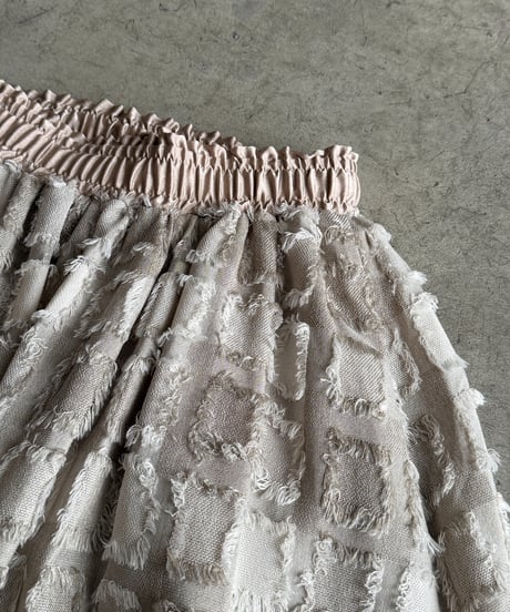 fringe block check skirt