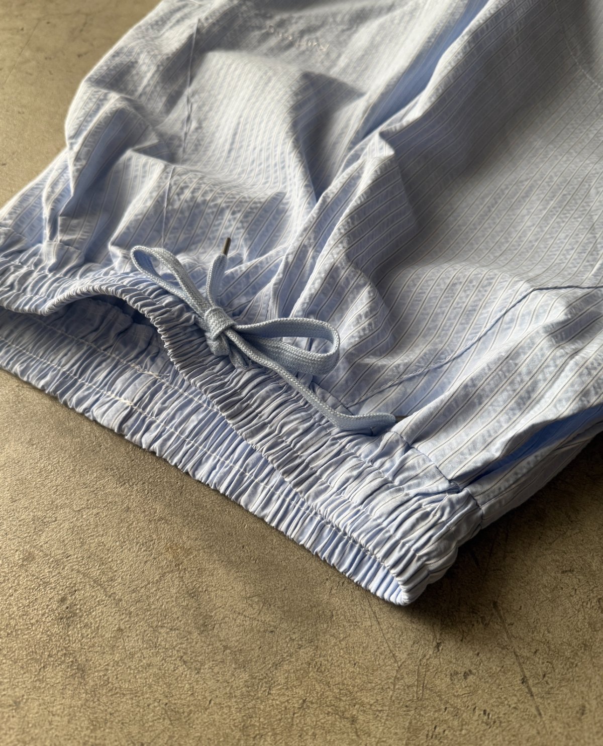RUSSELUNOR ストライプスポーツパンツ blue stripe jogger pants | ARULLE