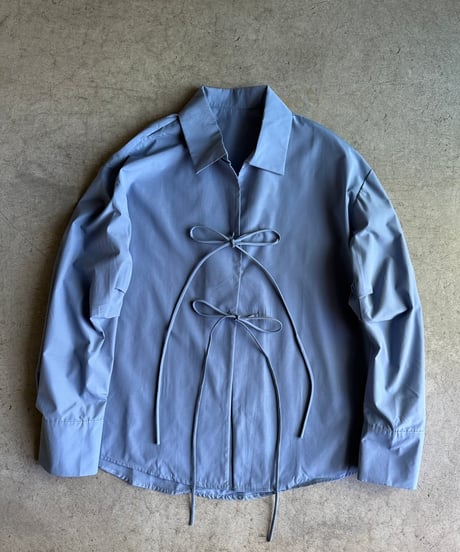 front ribbon blue shirt
