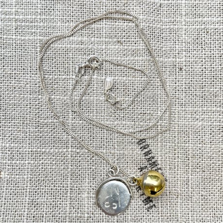 ”I love you & kiss me” spin bell necklace
