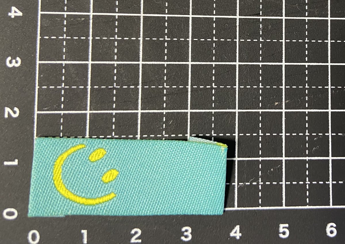 折り刺繍タグ にこちゃん エメラルドグリーン 5枚 | タグ屋ヤスオ