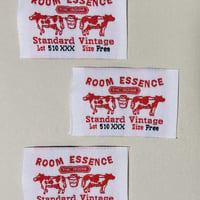 刺繍タグ　牛ROOM ESSENCE