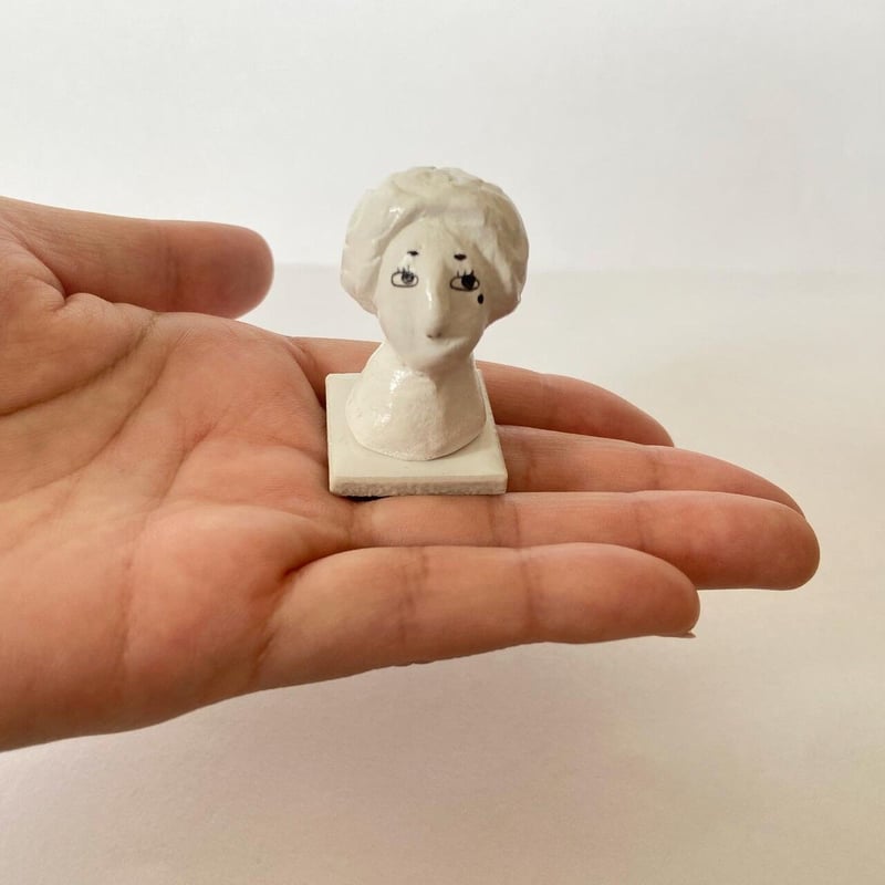 壁掛け。紙粘土と石粉粘土の練 り合わせ。 石粉 ねんど