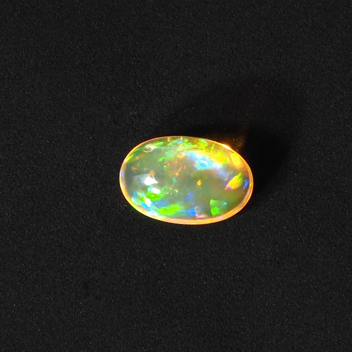 燃え立つ遊色】ファイヤオパール 0.85ct | まるむ商会