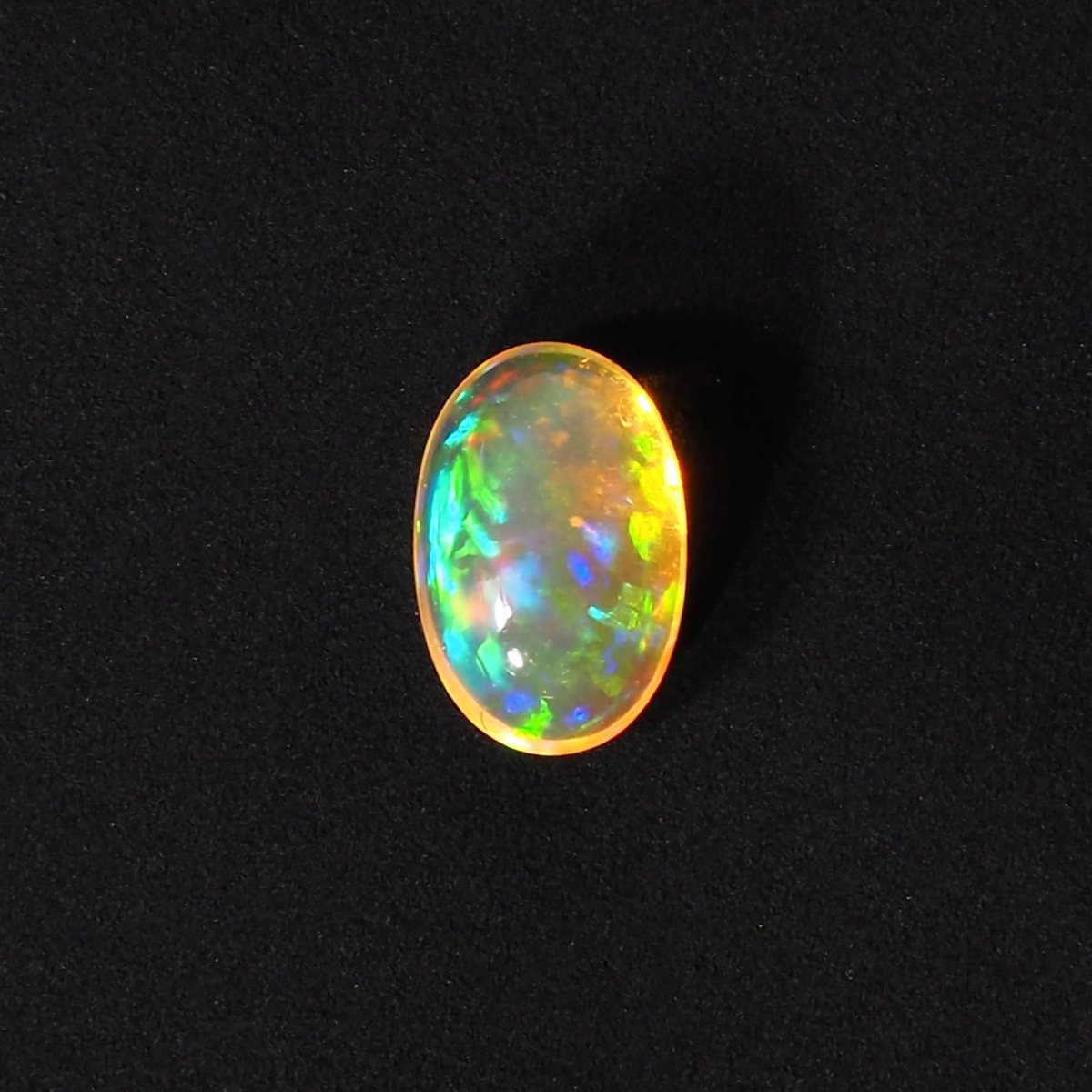 青い斑の浮かぶ魅力的なオレンジオパール74.5ct/ファイアオパール/鉱物標本