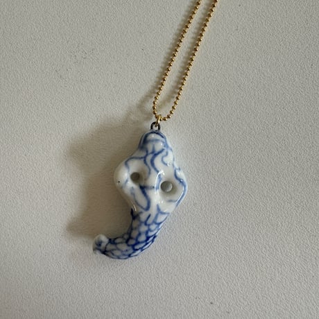 Tiny ceramic mermaid