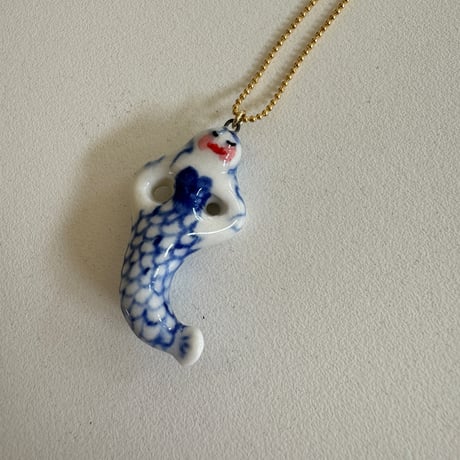 Tiny ceramic mermaid