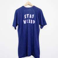STAY WEIRD STRETCH TEE